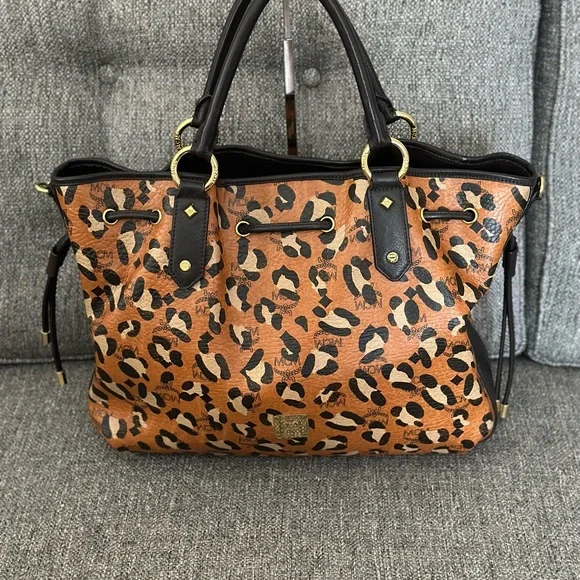 MCM Bags Euc Mcm Visetos Leopard Print Large Drawstring Shoulder Bag Cognac Poshmark